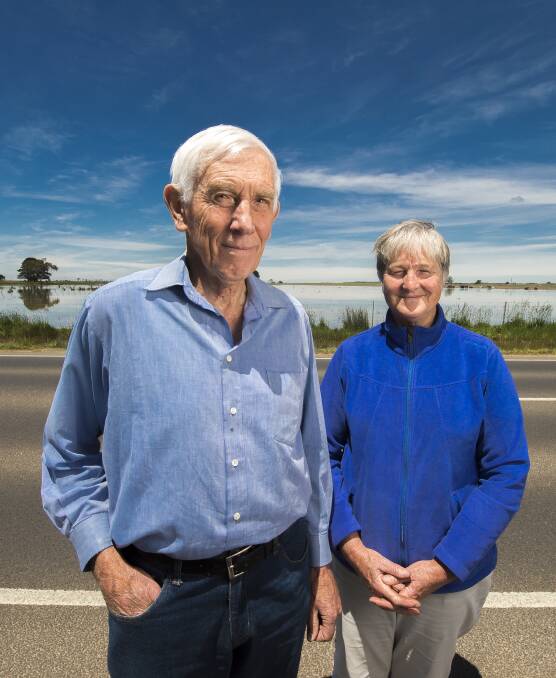 Save our swamp: Gavin Cerini and Mullawallah wetlands volunteer Sandra Dillon in front of the Ballarat-Carngham Road wetland. Picture: Luka Kauzlaric