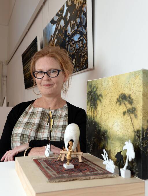 Psychological landscapes: Sydney artist Rosie Perl with 'The Artist in her Studio, Body Mask on Easel' at The Lost Ones gallery. Picture: Kate Healy