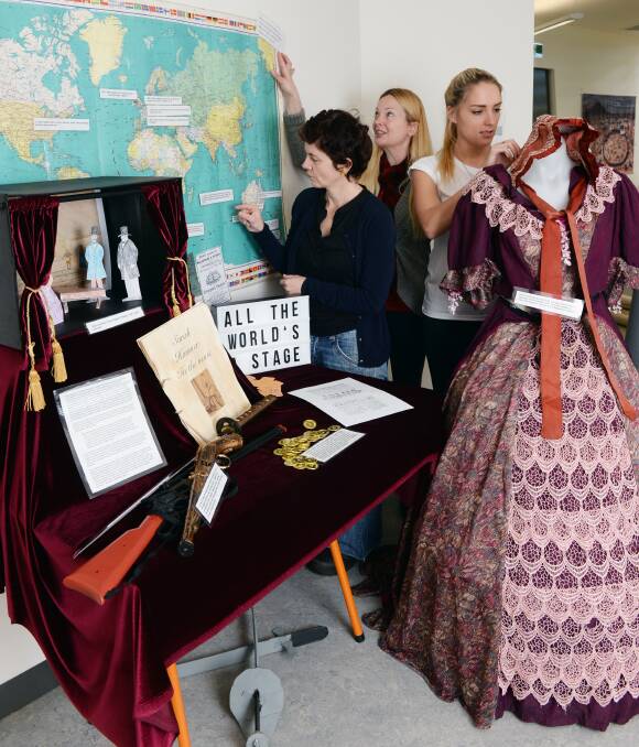 A bold woman: Angela Richmond, Becci Valentine and Jessica Gorvin prepare their display on Stockade figure Sarah Hanmer. An exhibition looking at Ballarat's key democratic figures will open this Sunday. Picture: Kate Healy