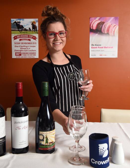 Bets are on: Seymours waitress Ella Eade prepares for Tuesday's gourmet buffet lunch, a special treat for Melbourne Cup Day. Picture: Kate Healy