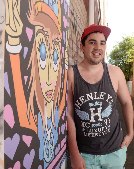 Struggles: Indigenous artist Josh Muir said he fell "into a black hole" over the death of his brother. An exhibition of his work will launch this weekend. Picture: Kate Healy