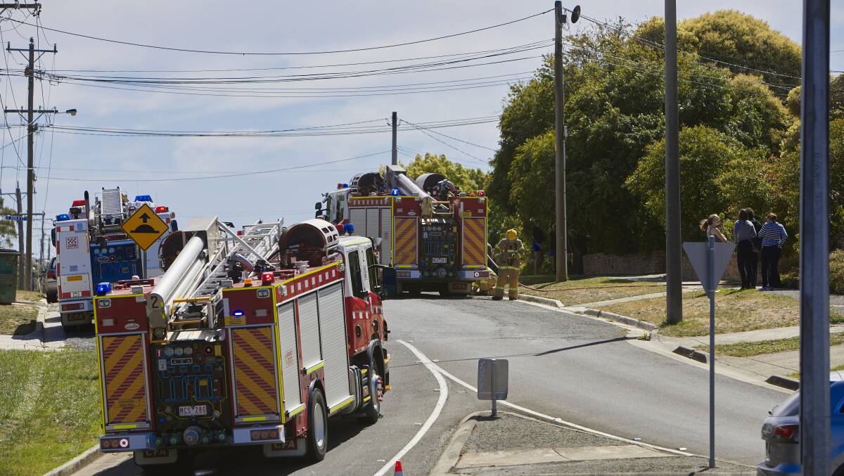 BLOCKED OFF: A small house fire caused Sherrard Street to be closed near the intersection with Howitt Street about 12.30pm. Picture: Luka Kauzlaric