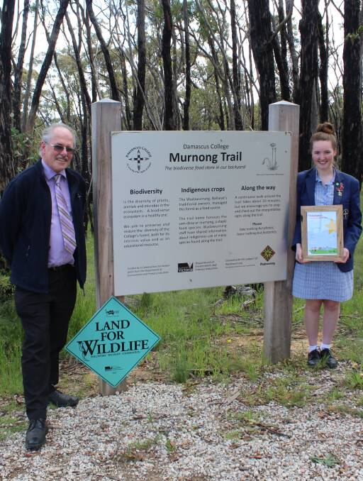 HONOURED: Damascus College sustainability coordinator David Neate and year 12 student Claire Roberts at the Murnong Trail. Picture: Sarah Boswell