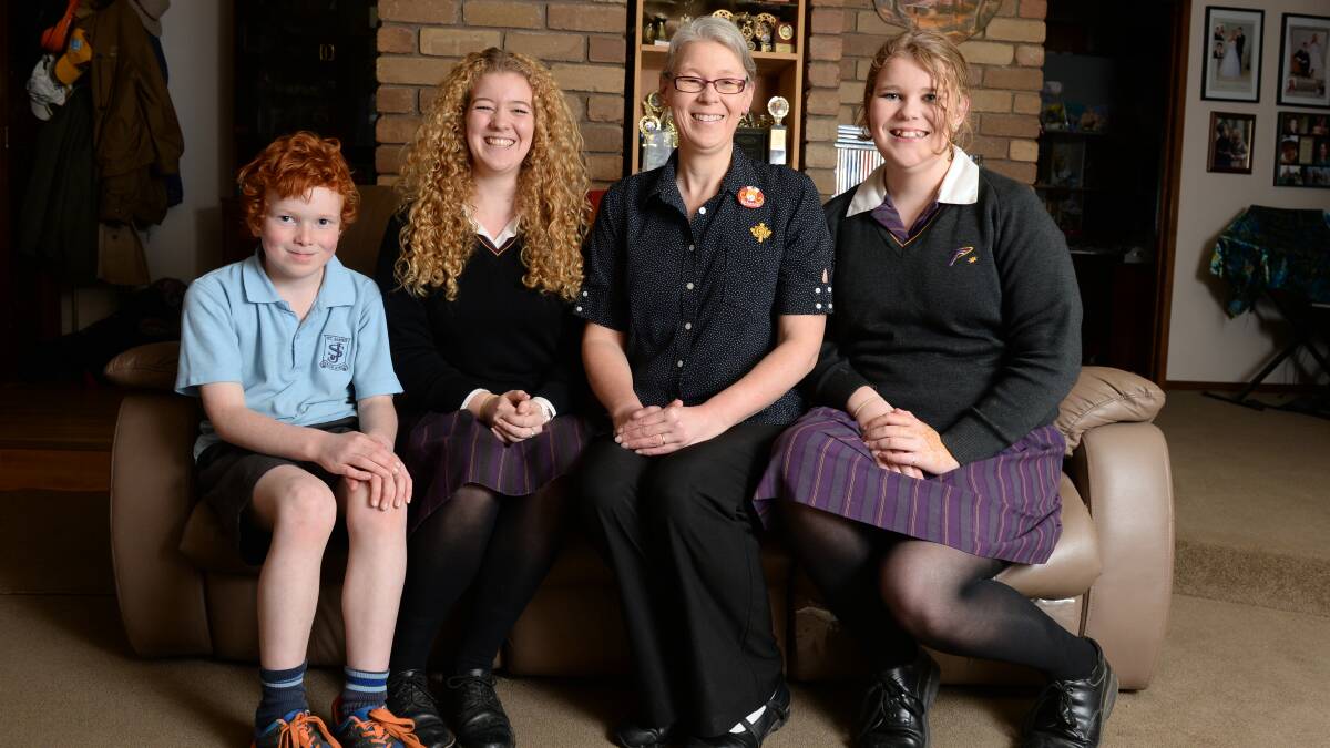 IN LEAPS AND BOUNDS: The Liston family, from left, Matthias, 8, Felicity, 17, Rebecca, and Rochelle, 14, have all benefited from The Smith Family programs. Picture: Kate Healy