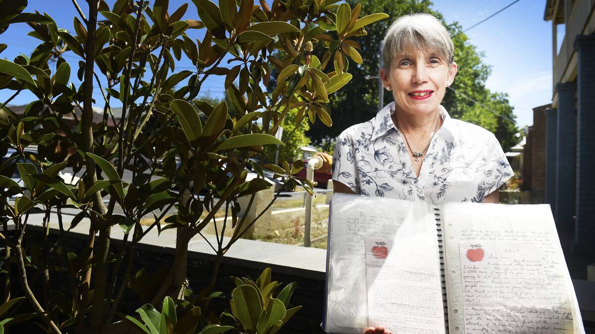 DEVOTION: Re-reading her husband's love letters has helped sustain Joan Brick since his death last year. Picture: Luka Kauzlaric