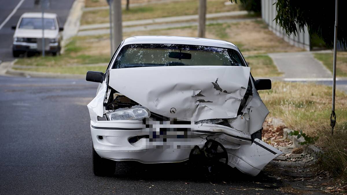 CRUMPLED: A white sedan was extensively damaged in an accident at Ballarat North this afternoon.