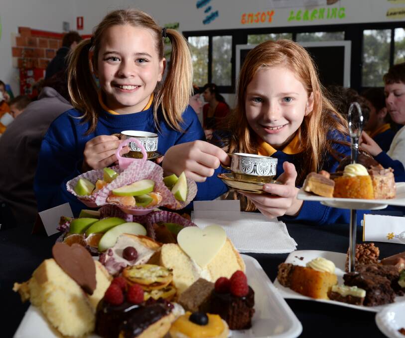 PROACTIVE: Layla Scicluna, left, and Taleah Irving organised Little Bendigo Primary School's Biggest Morning Tea. Picture: Kate Healy