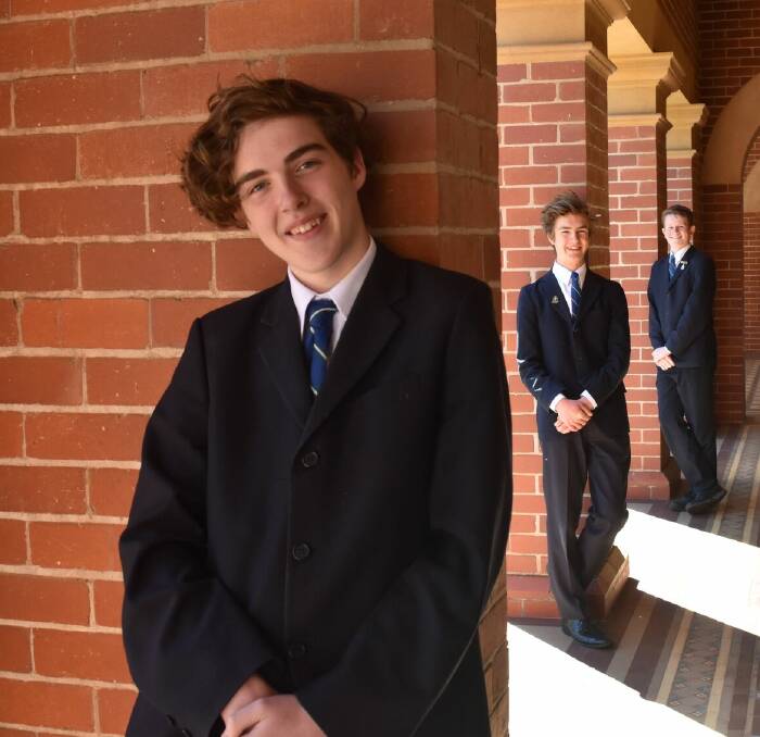 TOP TALKERS: St Patrick's College year 10 students, from left, Oscar Grigg, Xavier O'Shea and Ryan Mulheron prepare for the state debating titles. Picture: Paul Nolan