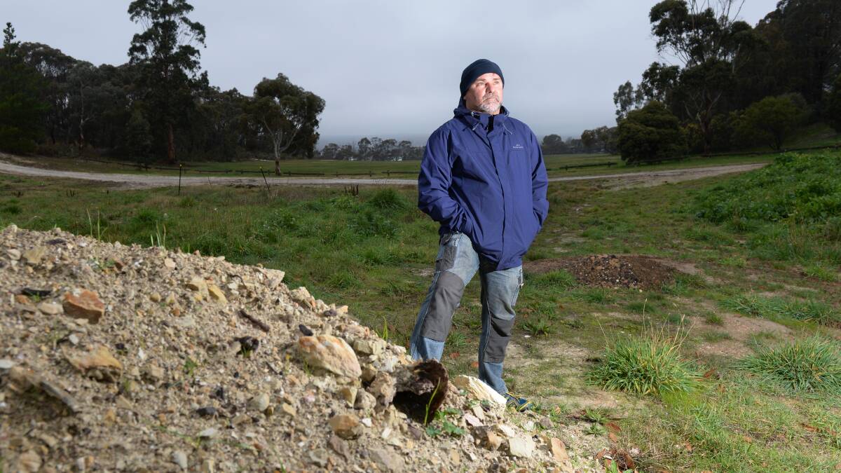 HEARTACHE: Black Hill landowner Mark Hosking says he feels vindicated by a City of Ballarat report that shows waste has overflowed from the former tip into nearby land.