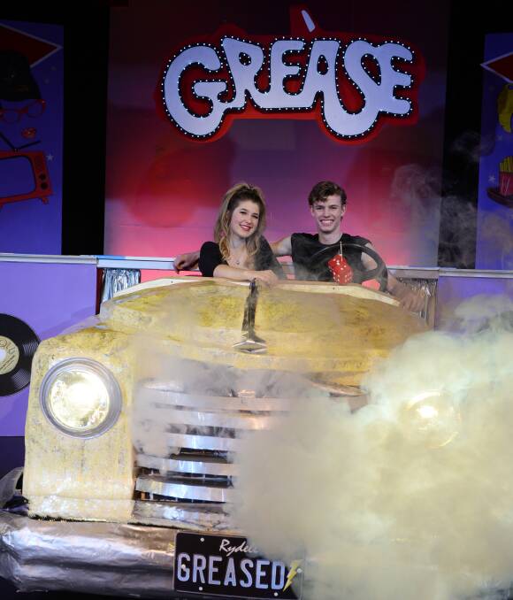 GREASED LIGHTNING: Olivia Valpied (Sandy) and Andrew Marriott (Danny) are full steam ahead for the Damascus College production of Grease. Picture: Kate Healy