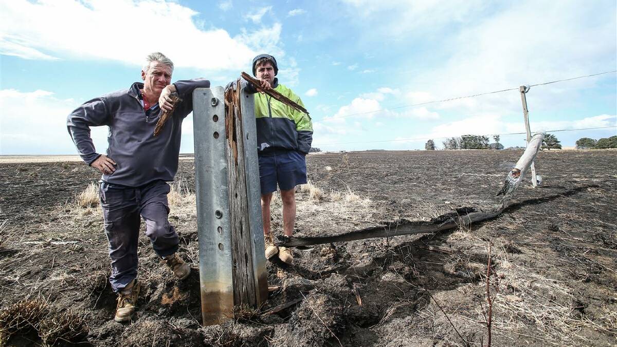 Bernie Harris and Jack Kenna Junior at the site of the The Sisters fire. Photo: Christine Ansorge, The Standard.