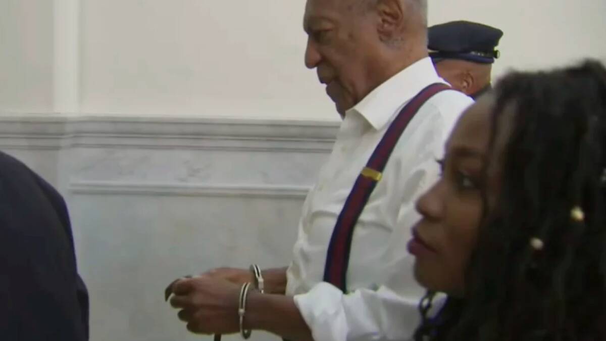 Bill Cosby is led away in handcuffs after he was sentenced. Photo: AP
