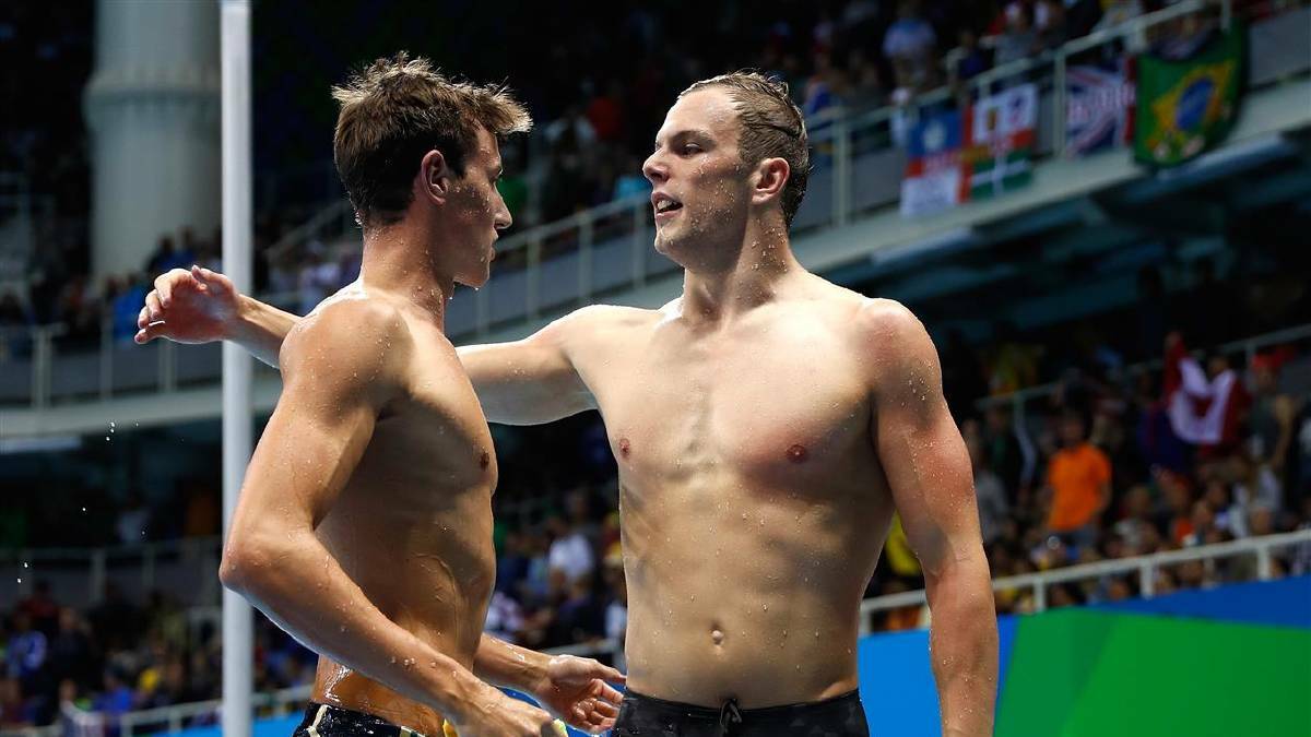 DAY 5: Cameron McAvoy (L) congratulates gold medal winner Kyle Chalmers (R) of Australia in the Men's 100m Freestyle Final on Day 5 of the Rio 2016 Olympic Games at the Olympic Aquatics Stadium on August 10, 2016 in Rio de Janeiro, Brazil. Photo: Clive Rose/Getty Images
