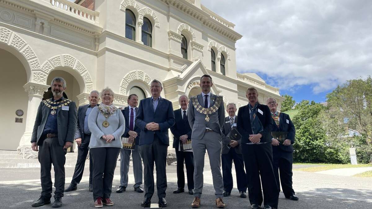 COUNCILS UNITED: Representative councillors from the Victorian Goldfields region stand with former premier Denis Napthine outside the Clunes Town Hall. PICTURE: Caleb Cluff