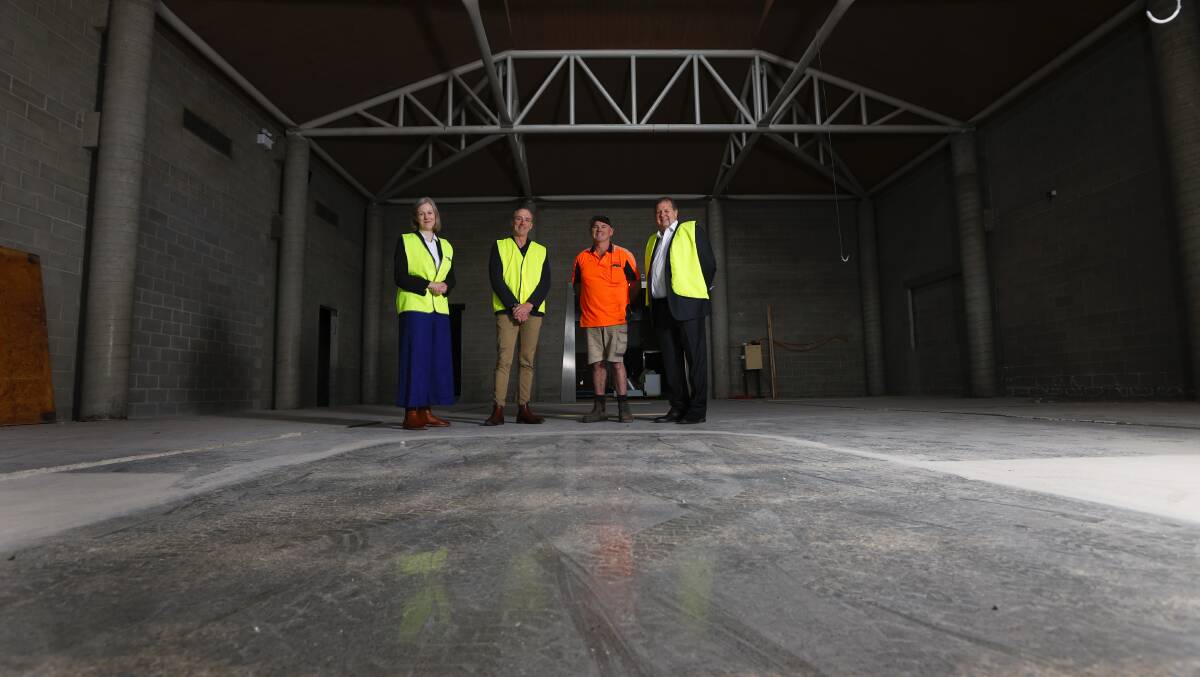 TRANSFORMED: Sovereign Hill CEO Sara Quon, chief engineering officer Chris Hutton, builder Stuart Menhennet and board president Craig Fletcher inspecting the works at the former gold museum. Picture: Luke Hemer.