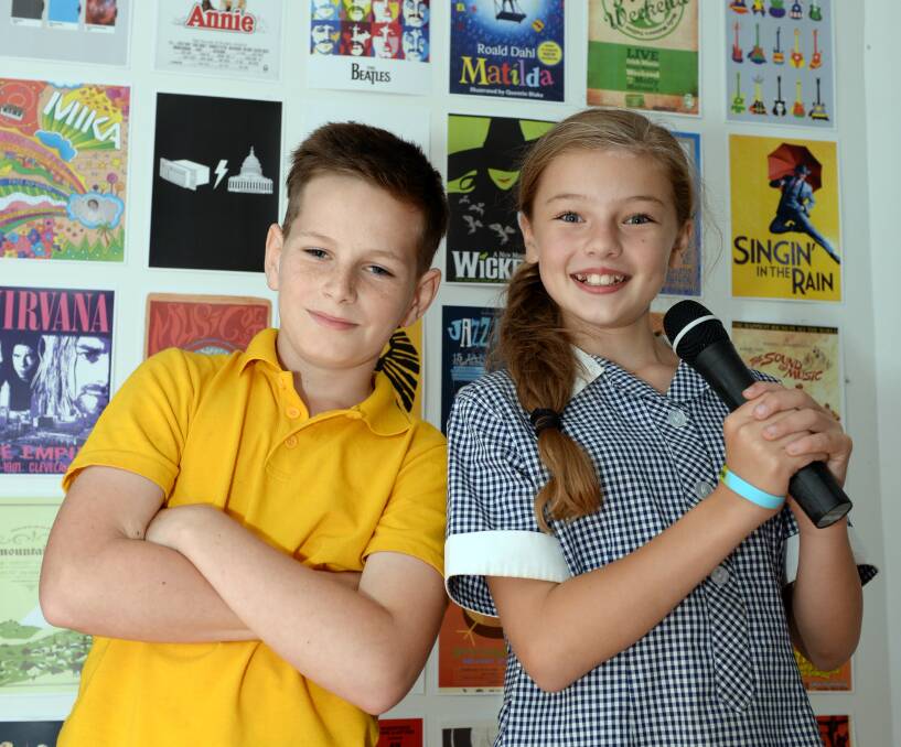FUTURE STARS: Canadian Lead Primary School pupils Curtis Laurie, 10, and Allera Bee, 10, were awarded performing arts scholarships. Picture: Kate Healy