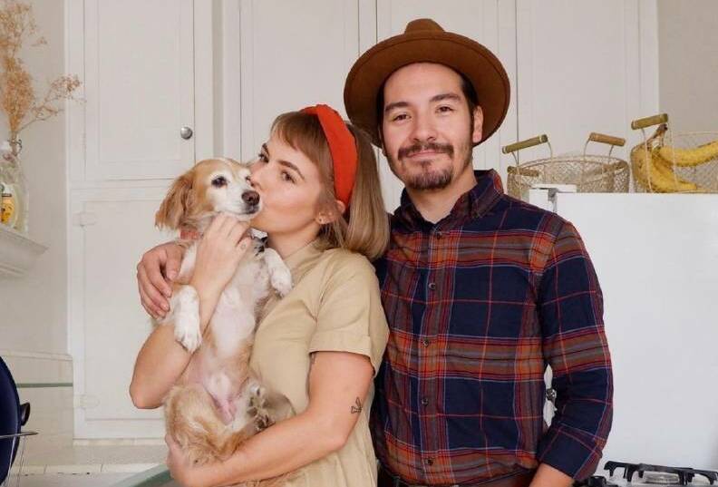 HOPEFUL: Victorian couple Dylan-Lee and Emilio Polanco, with their dog Obi, were bumped off their Los Angeles flight to Australia last month.