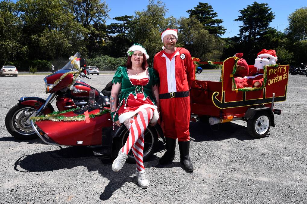 Alfredton's Dianne Fisher and David Tong in the festive spirit at Saturday's Ballarat Christmas Toy Run, which supports families in need. Picture by Adam Trafford
