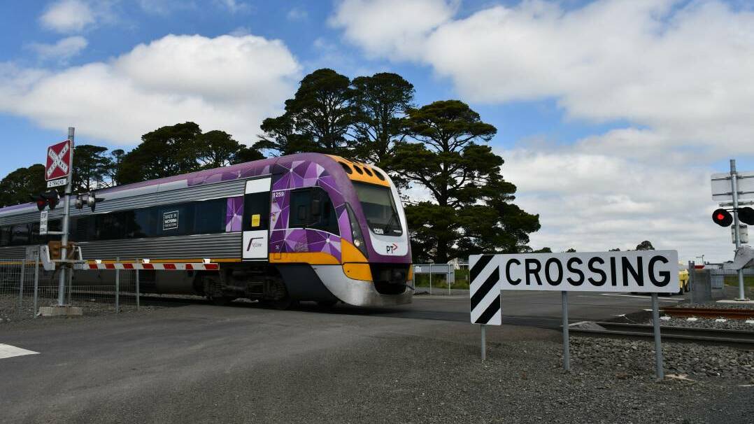 TRAVELLING: A V/Line train crossing at Ballarat. Picture: The Courier