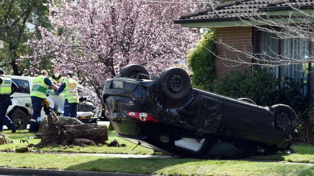 COLLISION: A black hatchback came to a rest on its roof after a crash at the intersection of Grant and Morgan Streets in Sebastopol on August 16. Picture: Kate Healy