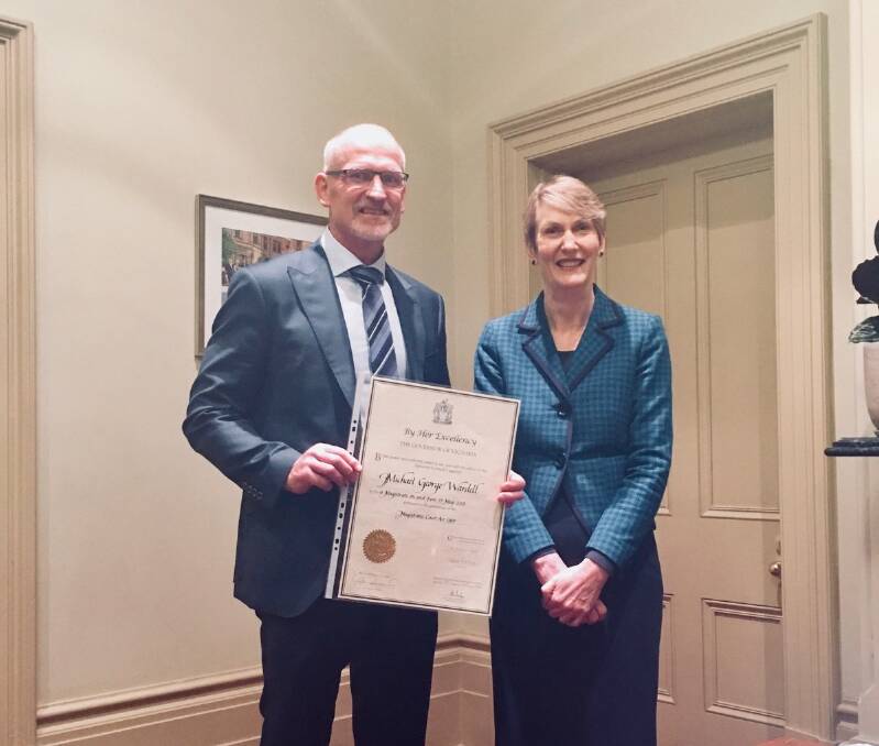 Congratulations: Former Ballarat solicitor Mike Wardell with Supreme Court of Victoria Chief Justice Anne Ferguson at a swearing-in ceremony in Melbourne.