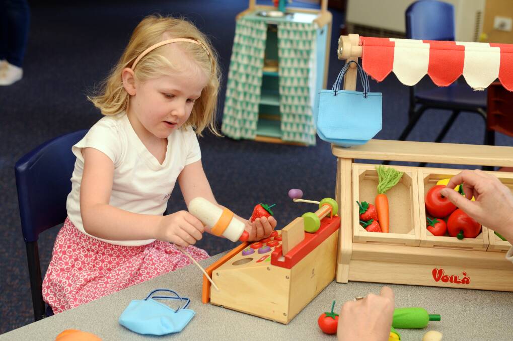 Florence, 5, is busy playing at a previous National Playgroup Week event at St Columba's Primary School. National Playgroup Week runs from March 20 to 26. Picture by Kate Healy