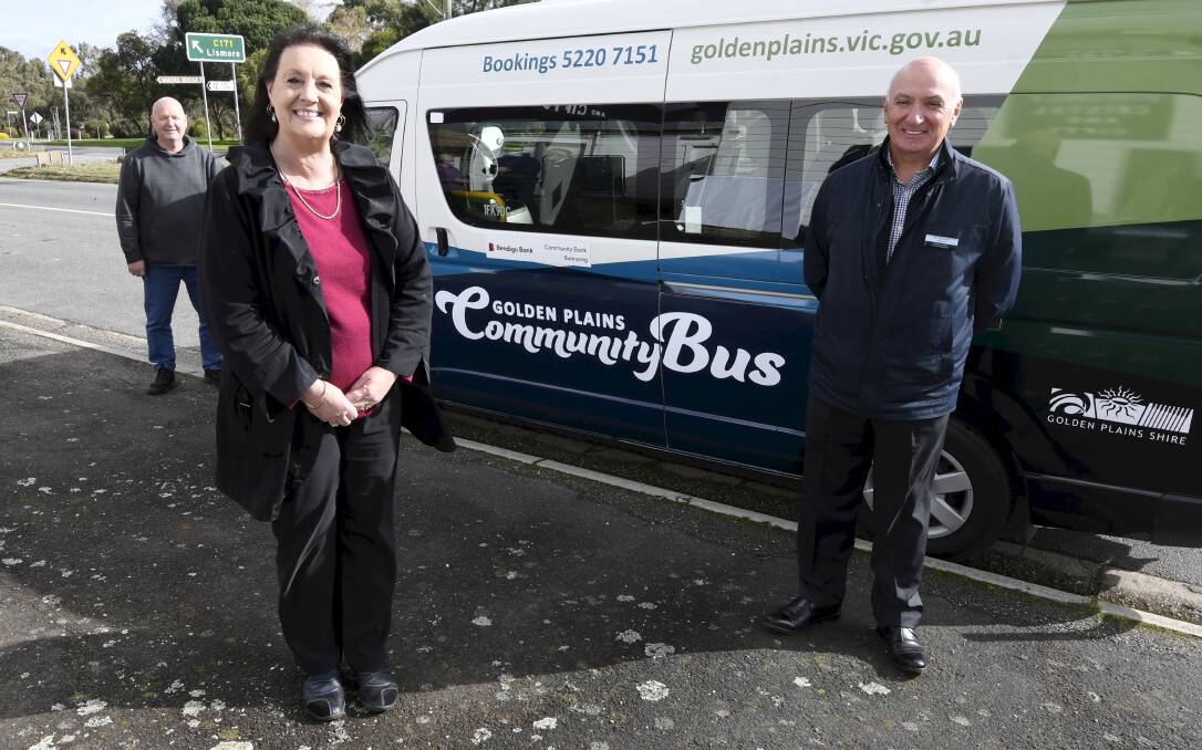 Bus driver Daryl Jenkins, former Golden Plains Shire Council mayor Helena Kirby and Buninyong and District Financial Services chairperson Ian Corcoran launch the community bus service trial in 2021. Picture: Lachlan Bence
