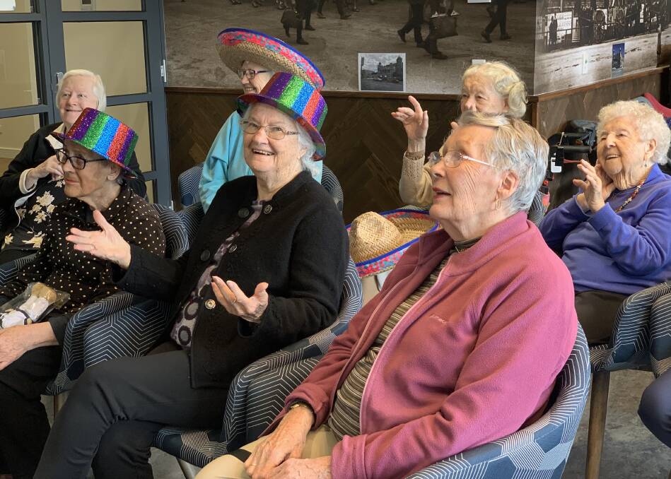 JOYFUL: Mercy Place Ballarat residents enjoying a Playgroup Victoria's intergenerational playgroup online session. Picture: supplied