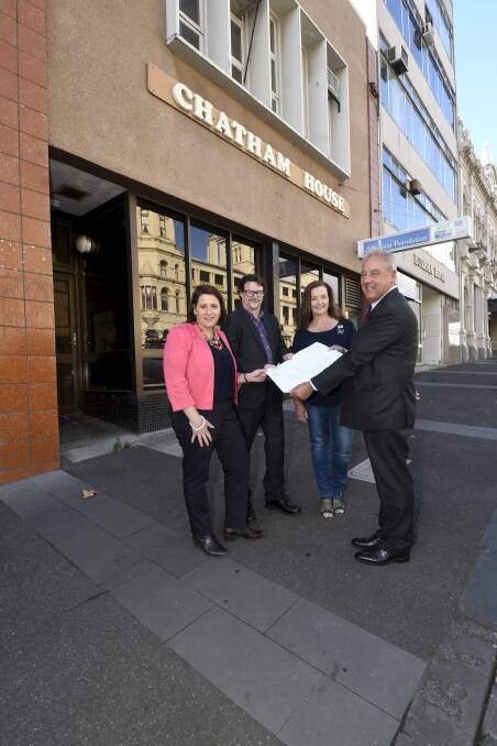 Member for Wendouree Juliana Addison, Ballarat Foundation chief executive Andrew Eales, L2P/Ballarat Reads volunteer Helen Bloom and Ballarat Foundation chairperson Wayne Weaire inspect the plans to redevelop Chatham House. Picture: Lachlan Bence