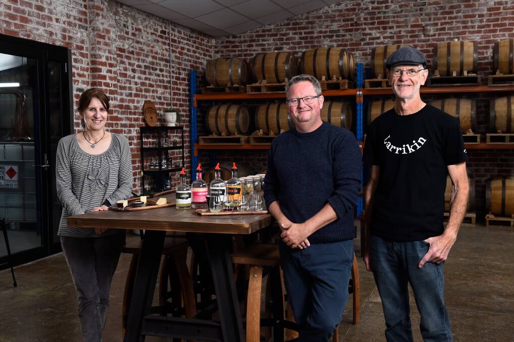 GROWING: Kilderkin Distillery owners and distillers Rebecca Mathews, left, and Chris Pratt, right, with brand experience manager Anton Therkildsen, centre. Picture: Adam Trafford
