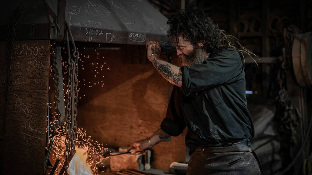 RARE: A Sovereign Hill blacksmith demonstrates during a 'Whisky in the Wheelwrights' workshop. Picture: supplied