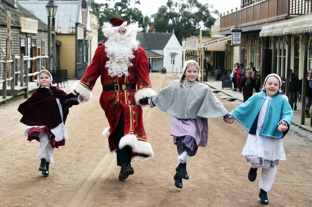 JOY: Breanna Danziger, 6, St Nicholas, Isabella Danziger, 8 and Penny Grothe, 7, are looking forward to Sovereign Hill's Winter Wonderlights show. Picture: Kate Healy