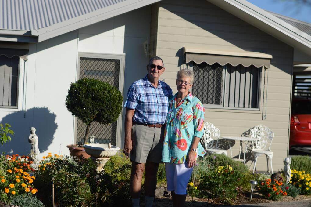 KEEPING ACTIVE: Allen 'Ben' and Laurel Hall enjoy the lawn bowls, library and swimming pool that are easily accessible in their retirement village in rural NSW. They downsized from their rural acreage.