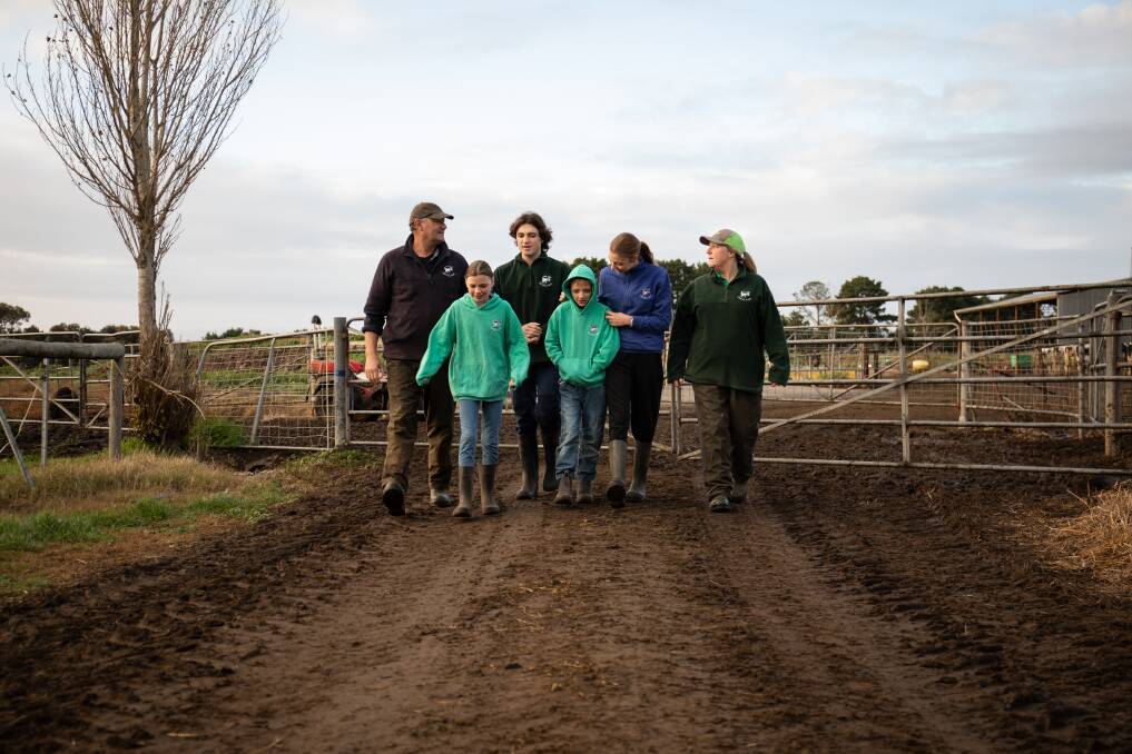 The Billing family: Thomas (16), Bridget (14), Isabella (12) and Henry (10), flanked by their parents Mark and Sam at the family dairy at Colac, Victoria. 