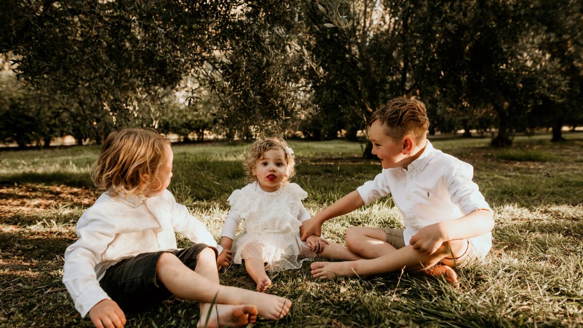Isla Hunter with her big brothers Paddy, 3, left, and Harry, 5, right. Picture: Justine Missen, Dream Cave 