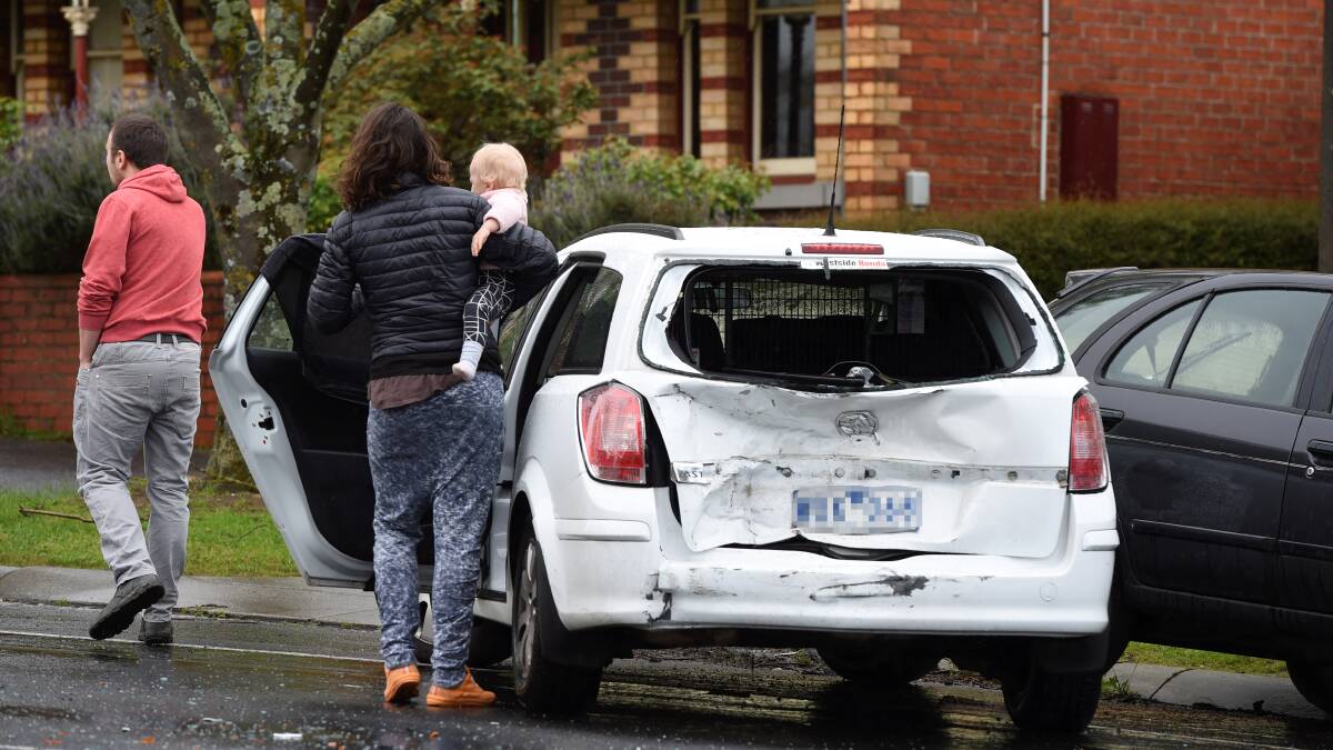 A white station wagon and another car appear to have collided during a minor incident on Lydiard Street this afternoon. Picture: Lachlan Bence 
