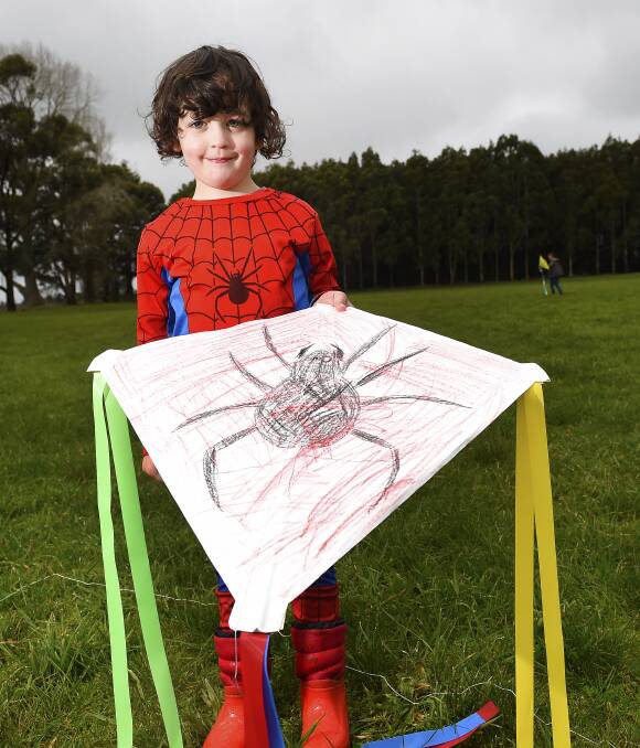  LET'S GO FLY A KITE: Billy Johnston, 4, shows off his Spiderman kite at eh Dean kite Festival on Sunday. Picture: Luka Kauzlaric 