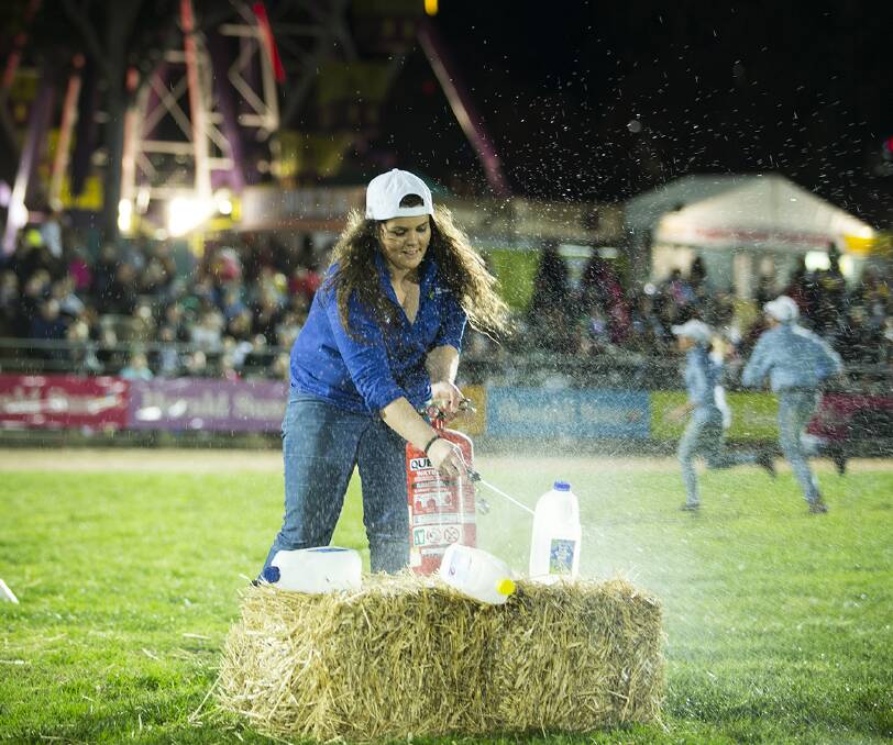 FARMING PROWESS: Winning young farmer Laura Ross gets competitive at the state challenge. Picture: Supplied 