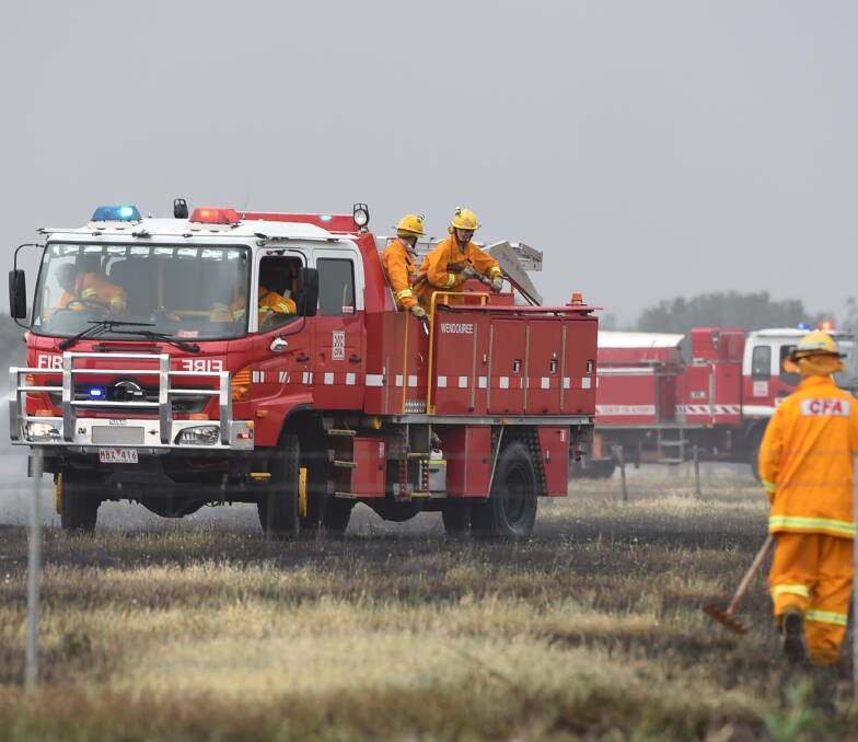 TERRIBLE CONDITIONS: Up to 12 fire trucks attended two grass fires in Lucas on a total fire ban day. Picture: Lachlan Bence 