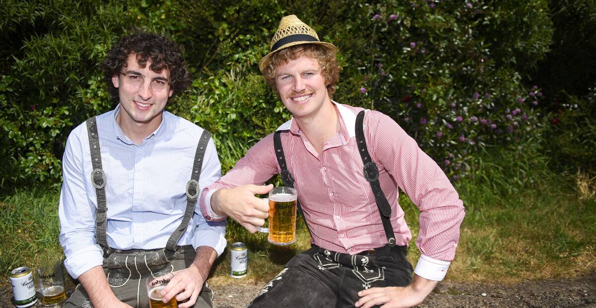 TIME TO CELEBRATE: Andrew Cox and Anthony Pearson enjoy a quiet drink at Kryal Castle Oktoberfest celebrations. Picture: Luka Kauzlaric