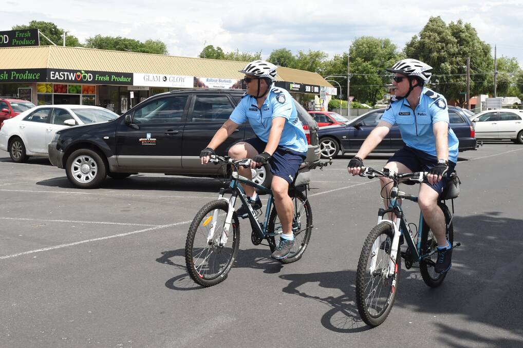 Bicycle-mounted officers Leading Senior Constable Peter Byvoet and Senior Constable Mark Partington. Picture: Kate Healy
