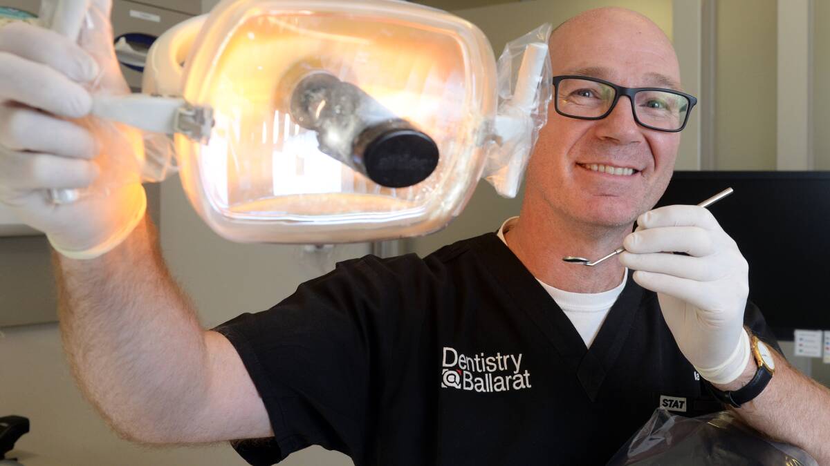 SAGE ADVICE: Ballarat dentist Ian Harper called on parents to start taking their children to dental checkups from the age of two so they familiarise themselves with proper healthcare before treatment is needed. Picture: Kate Healy 