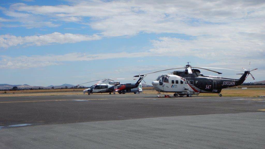 Firefighting helicopters at Ballarat Airport on Friday. Picture: Ballarat City Council
