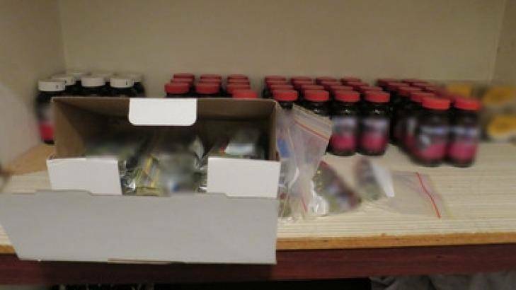 Vials of performance and image enhancing drugs, found in a seize in Kenwick. Photo: Supplied