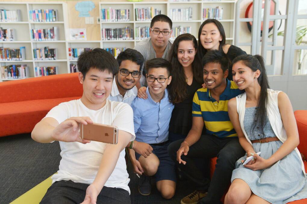 VCE students from Nossal High school celebrate the completion of year 12 and the school's VCE ranking. Photo: Joe Armao
