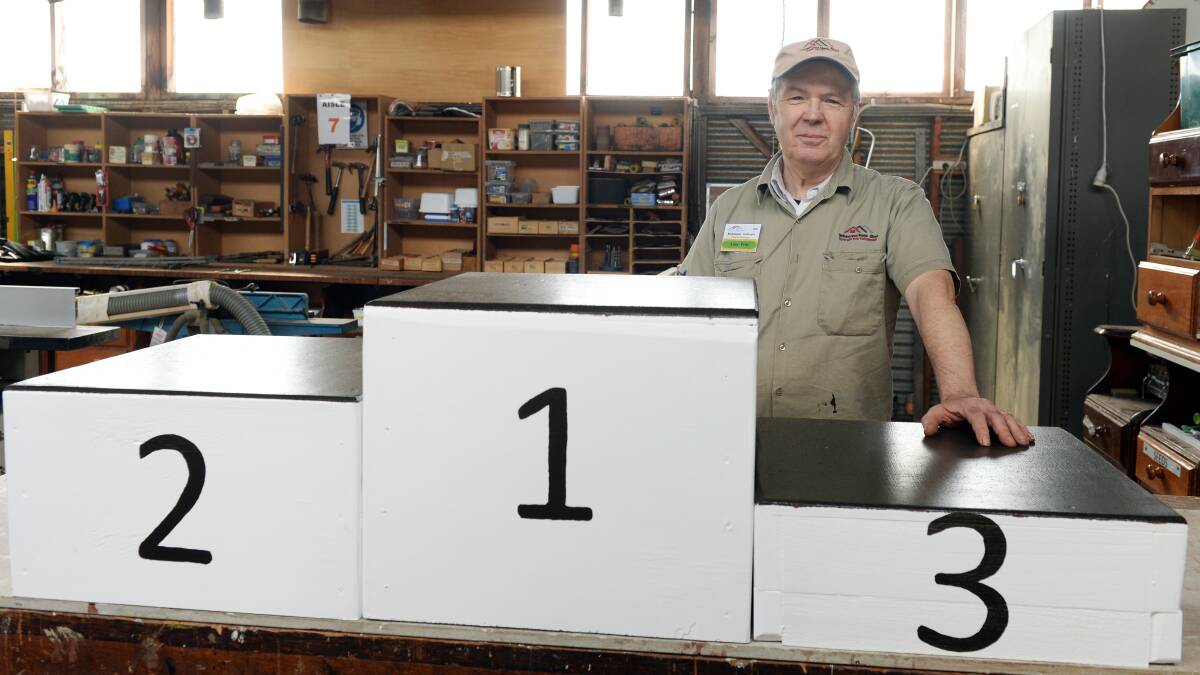 SHOWCASE: Sebastopol Men's Shed Aime Petit puts the podium finishing touches ahead of Run for a Cause. Picture: Kate Healy
