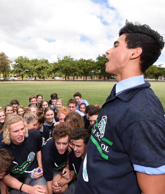 PRIDE: Ballarat High cheersquad leader Daniel Fairhurst ensures school spirit is firing with a vocal war cry in the yard after Boat Race assembly on Thursday. He wants High School to be heard. Picture: Lachlan Bence