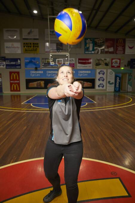 MAKING A PLAY FOR IT: Volleyball Ballarat committee member Georgie Hassell warms up on the Minderdome showcourt, which is set to become the home of her sport in Ballarat. Picture: Luka Kauzlaric
