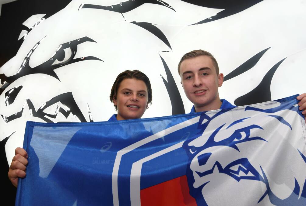 PROUD: Western Bulldogs Leadership Project participants Griffin Andrew and Anakin Bawden are cheering the start of their new community program and the looming AFL match in Ballarat next week. Picture: Lachlan Bence