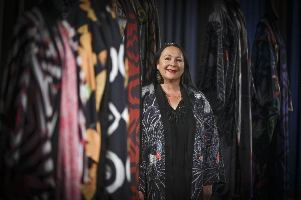 STORYTELLER: Emerging Wadawurrung elder and artist Deanne Gilson among the contemporary ceremonial cloaks inspired by matriarchal ancestor spirits. Picture: National Wool Museum